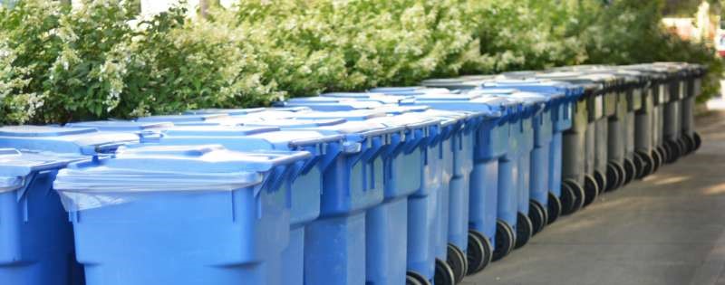 row of recycling & garbage can